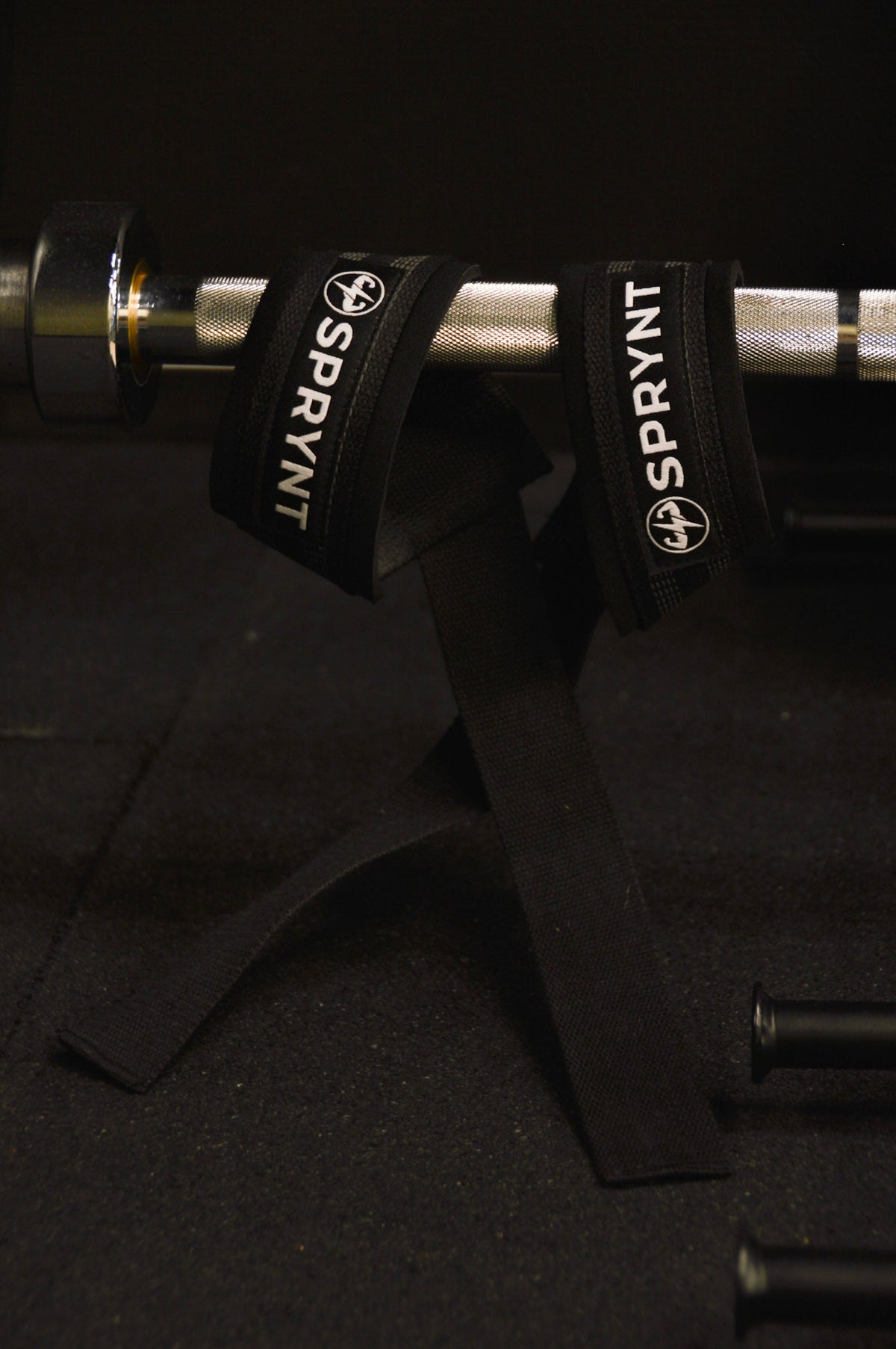 SPRYNT lifting straps aan een halterstang